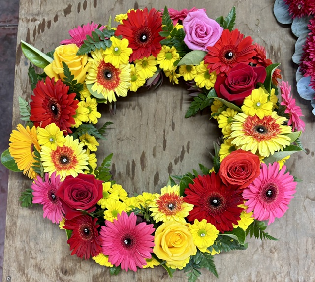 Colourful funeral wreath